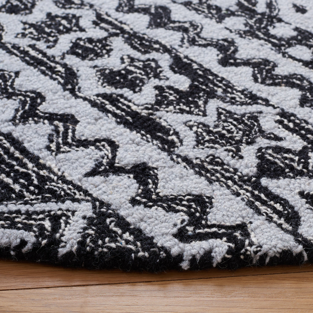 Micro-Loop 501 Rug | Safavieh - MLP501 - Black / Grey