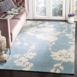 Safavieh Modern Art Rug Collection MDA621A - Blue / Ivory