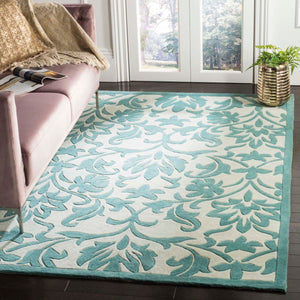 Safavieh Modern Art Rug Collection MDA635A - Ivory / Light Blue